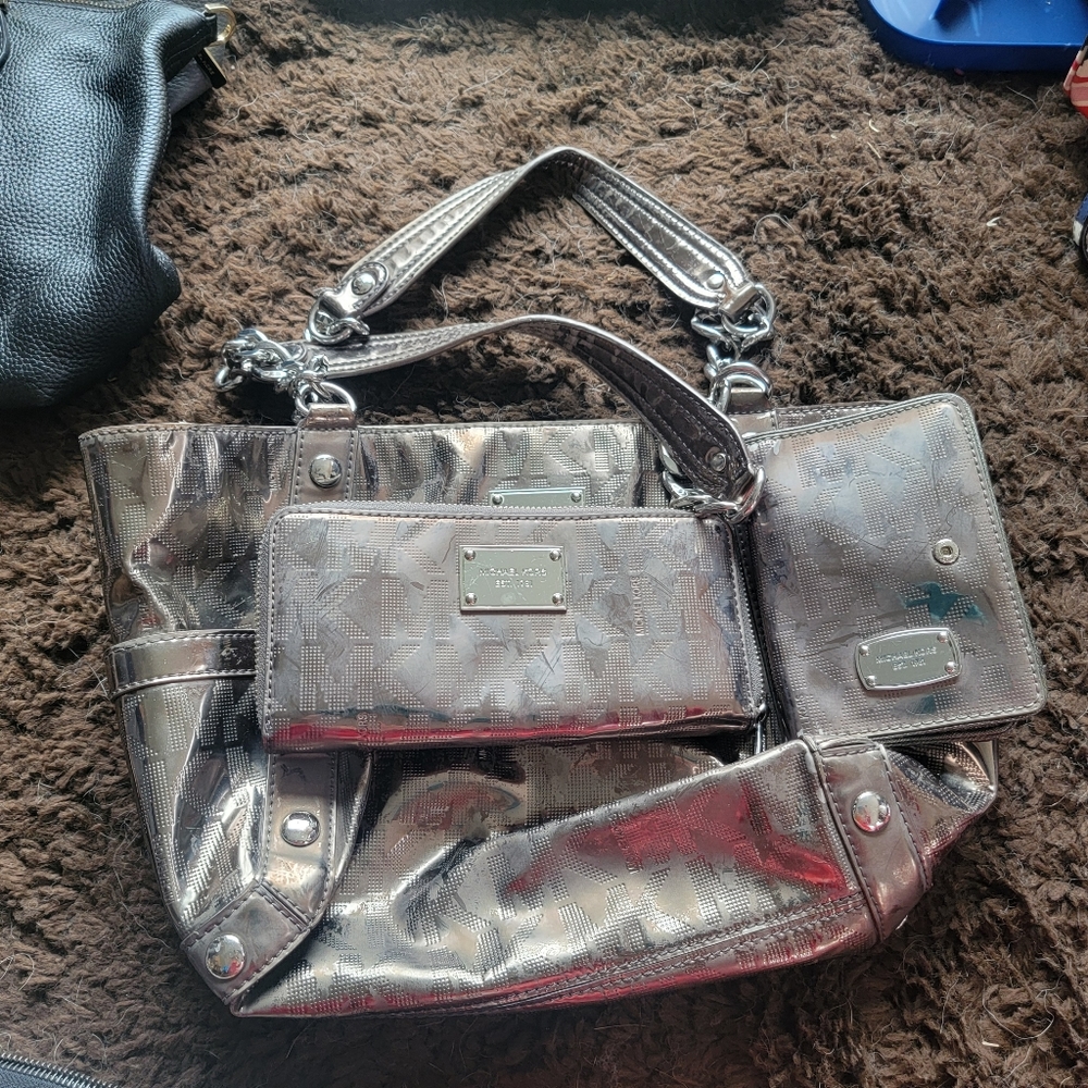 3 piece Michael Kors copper matallic purse with 2 wallets